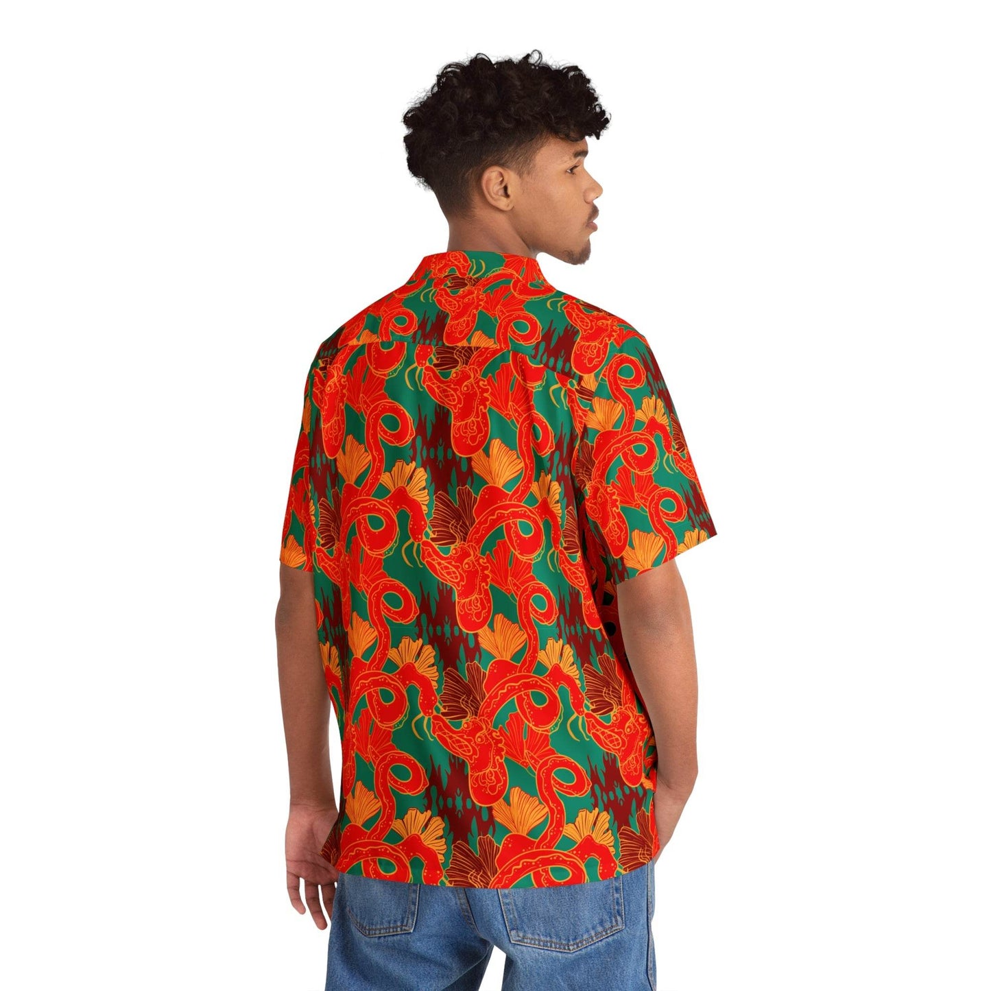 Back view of a man wearing a vibrant Chinese dragon Hawaiian shirt with red and green patterns