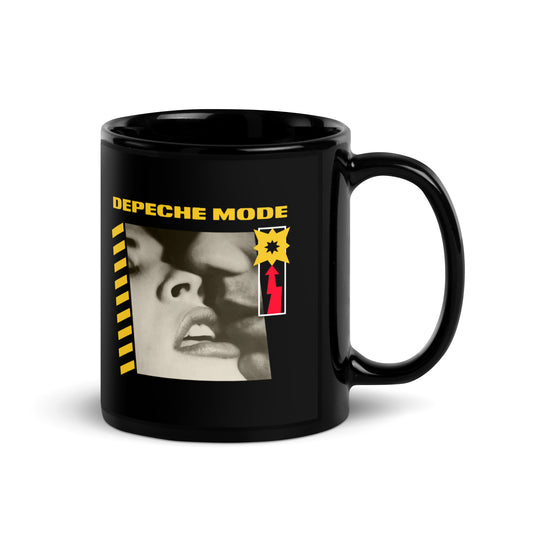 Black mug with Depeche Mode graphic and yellow text A Question of Lust coffee cup by 101SHIRTS